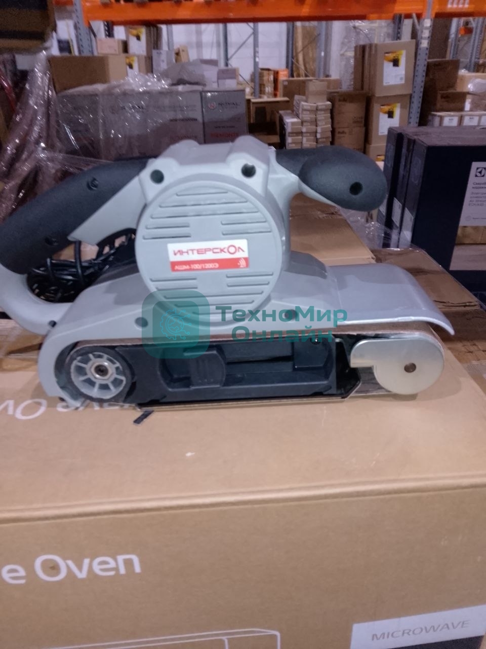 (Б/У) Ленточная шлифмашина ИНТЕРСКОЛ ЛШМ-100/1200Э (Б/У товар с признаками  эксплуатации/износа,  с  механическими повреждениями (вмятина, деформация  корпуса,  существенный некомплект), но при этом работоспособный в рамках основного функционала)