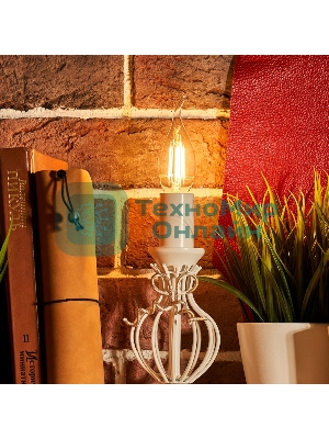 Лампа светодиодная филаментная Rexant Свеча на ветру CN37 9.5 Вт 950 Лм 2700K E14 прозрачная колба