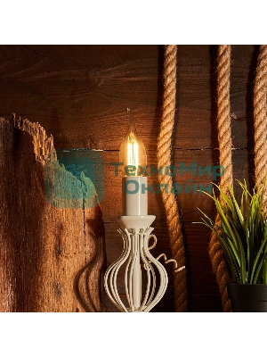 Лампа светодиодная филаментная Rexant Свеча на ветру CN37 7.5 Вт 600 Лм 2700K E14 диммируемая, прозрачная колба